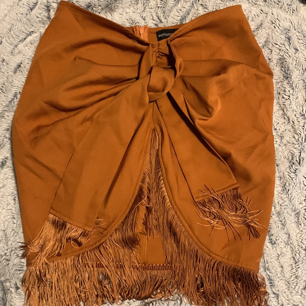 Pretty little thing tassel wrap skirt